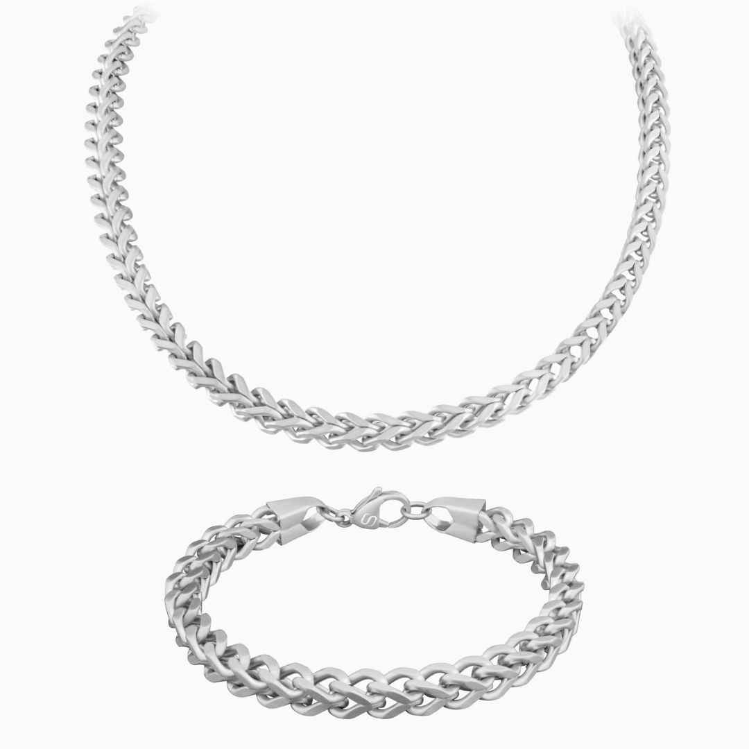 Franco chain-set i silver med halskedja och armband mot vit bakgrund.#en:color_silver,sv:farg_silver