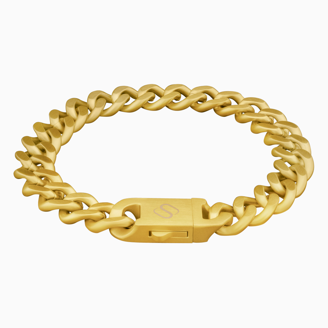Guldfärgad variant av armbandet frilagd, med blank yta och samma kubanska länk.#en:color_gold,sv:farg_guld