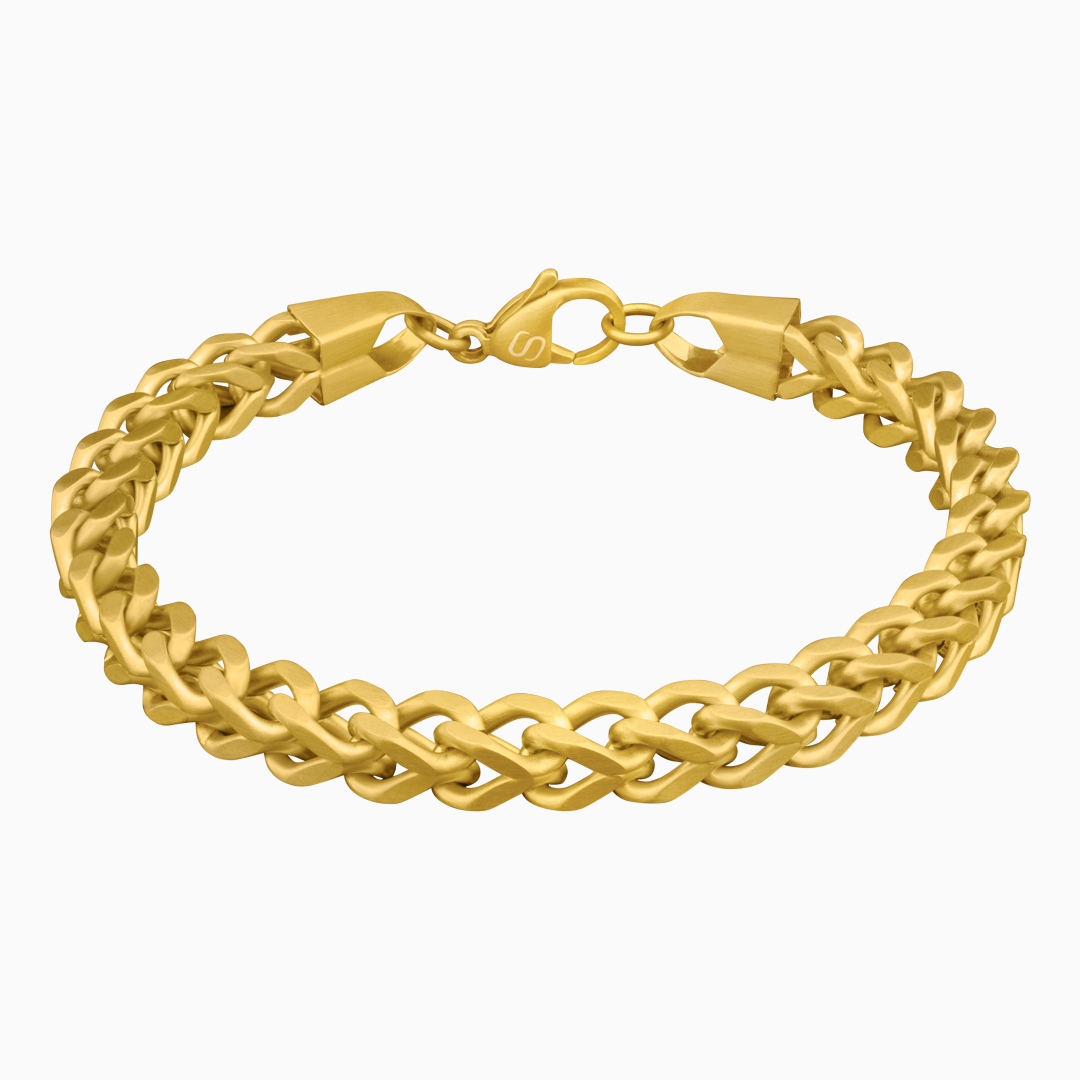 Guldfärgat Franco-armband frilagt, med samma täta länkar och klassiskt lås.#en:color_gold,sv:farg_guld
