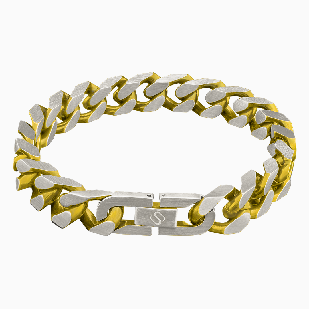 Cuban link-armband i guld och silver, frilagd mot vit bakgrund.#en:color_gold,sv:farg_guld