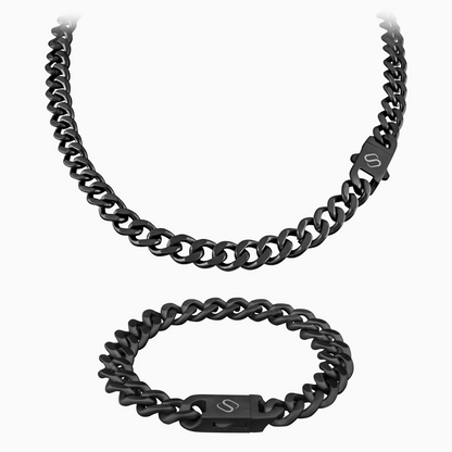 Set med svart cuban link-halskedja och matchande armband mot vit bakgrund.